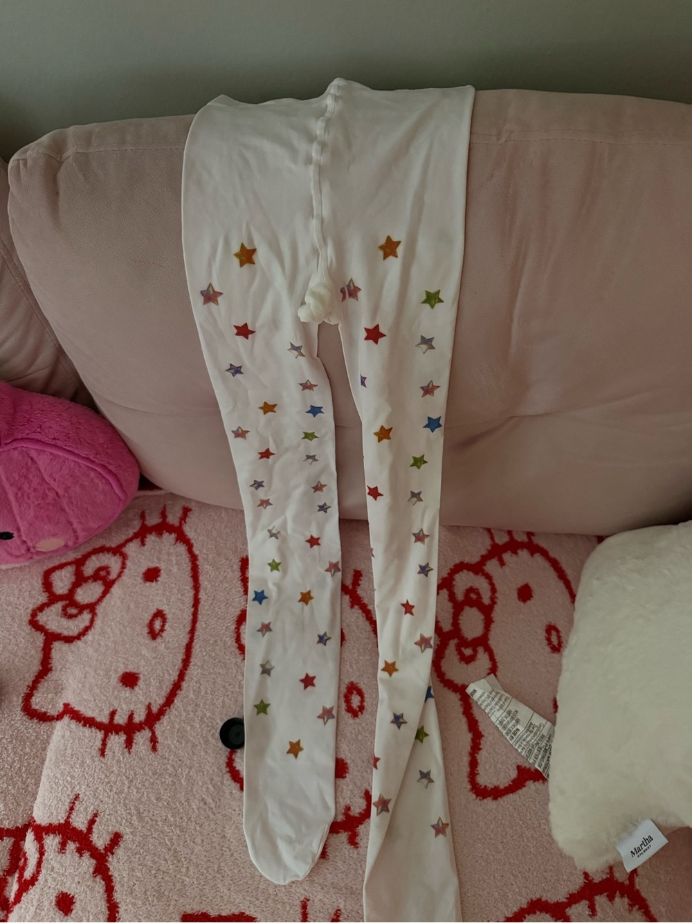 White tights with multicolored stars